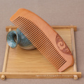 FQ marque cheveux logo personnalisé sculpture dents larges massage peigne en bois de pêche